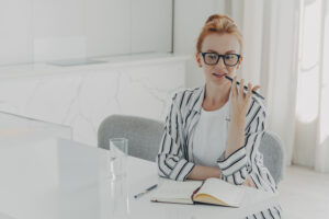 website strategy woman talking on speaker phone